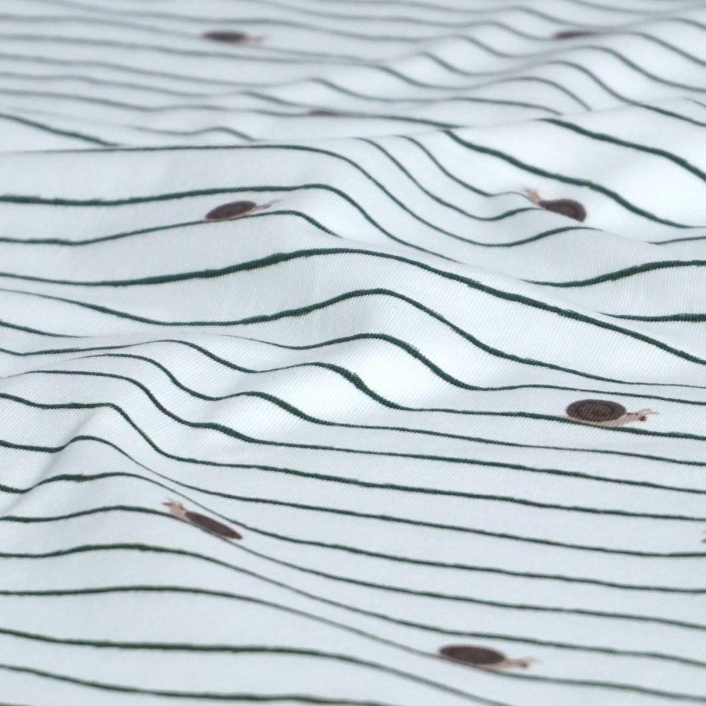 Baumwolljersey Schnecke grün ecru